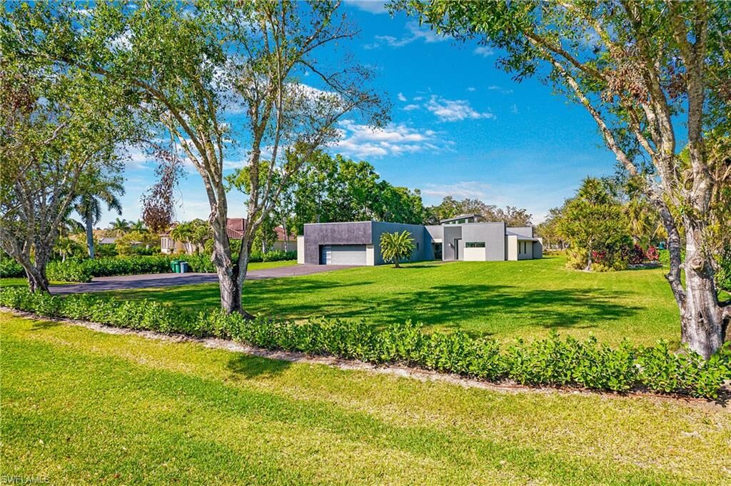 Property Photo:  6659 Livingston Woods Ln  FL 34109 
