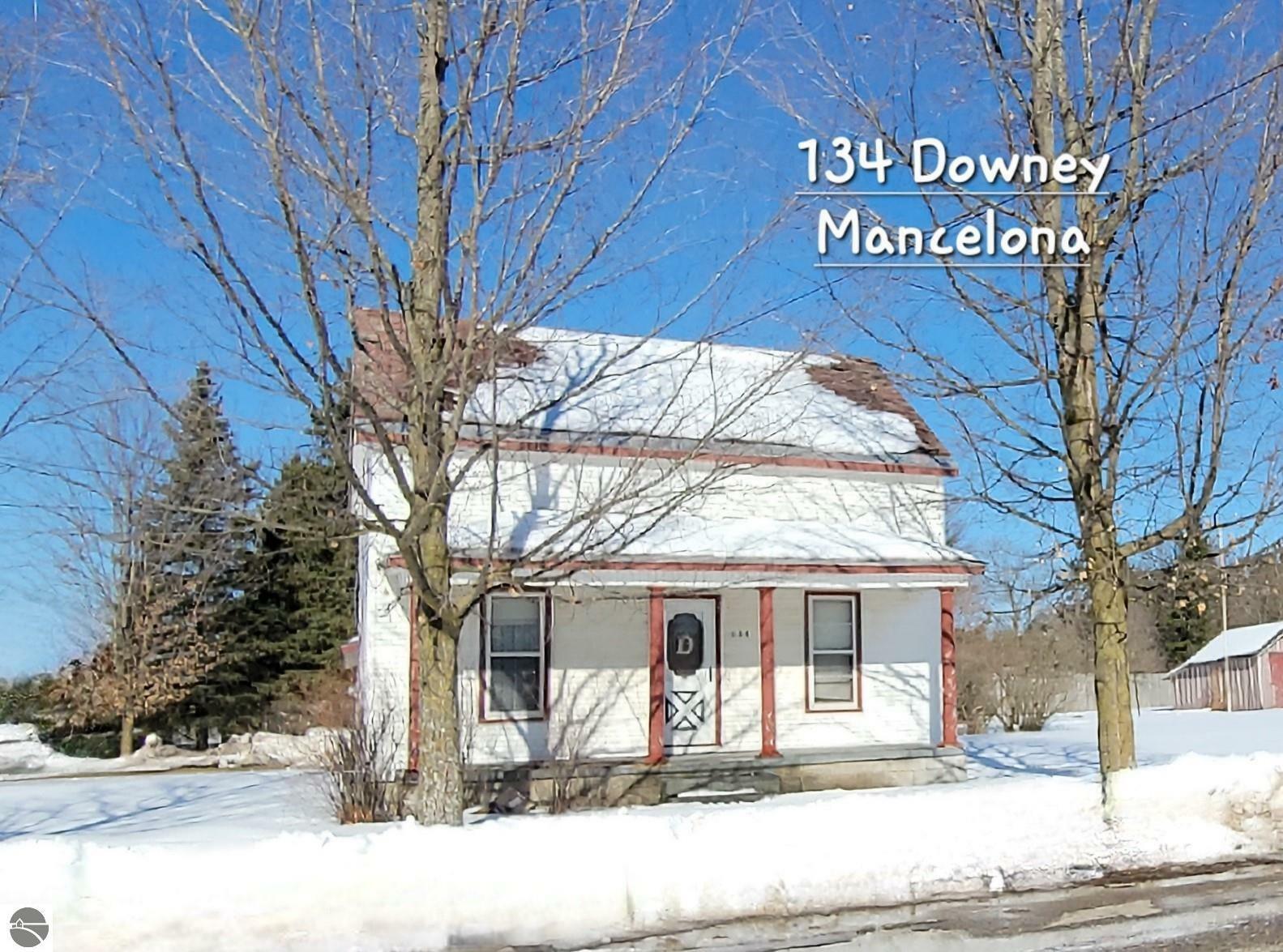 Property Photo:  134 Downey  MI 49659 