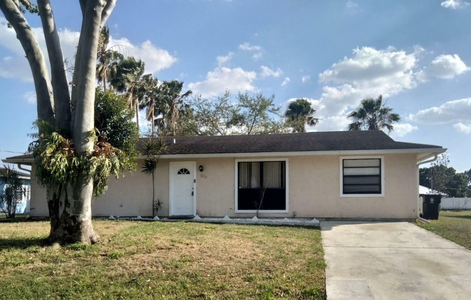 Property Photo:  1232 SW Sudder Avenue  FL 34953 