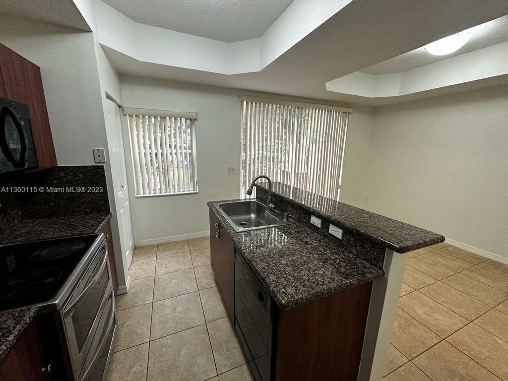 Property Photo:  3070 S Red Mangrove Ln S 202-2  FL 33312 