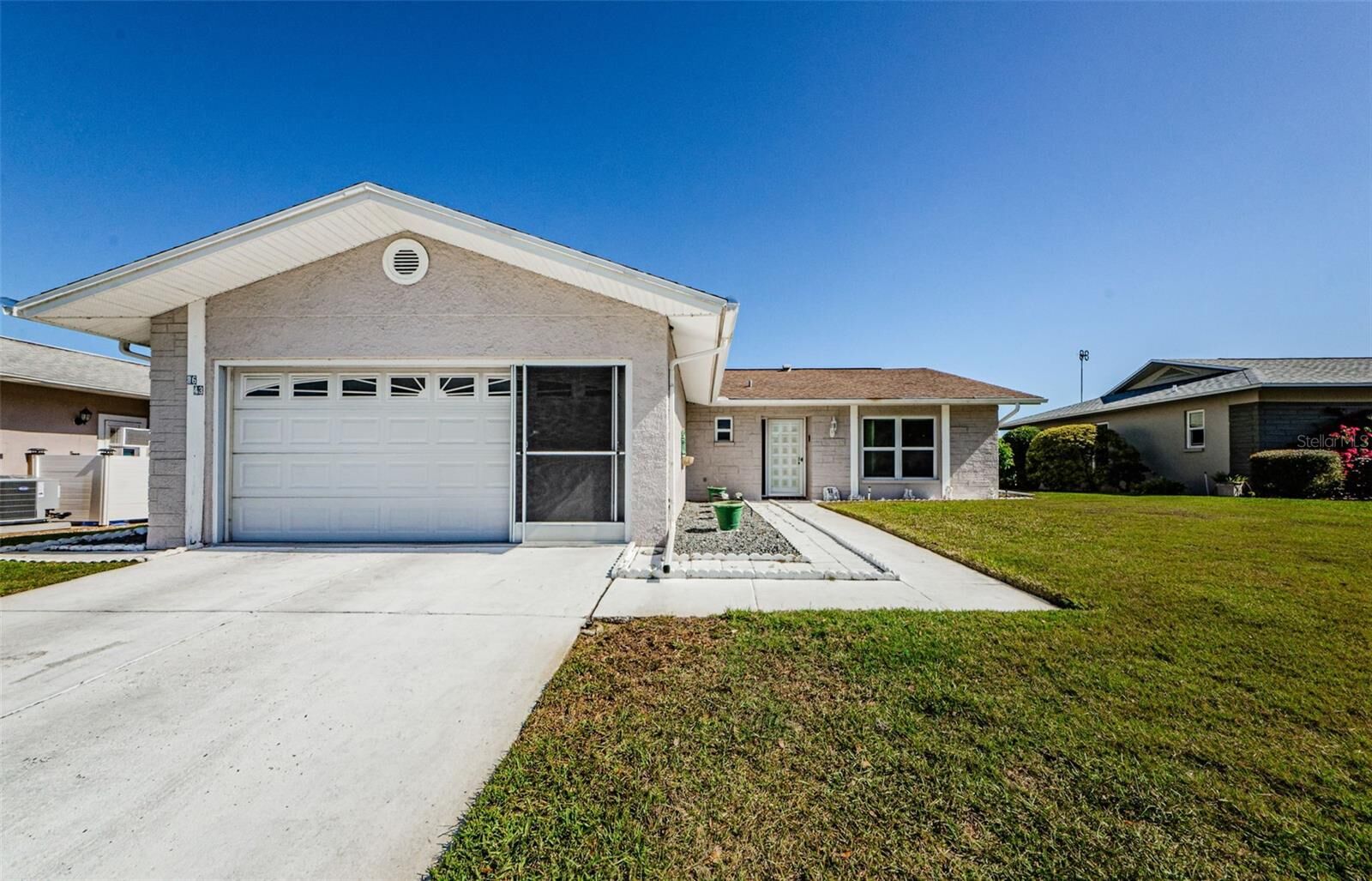 Property Photo:  8643 Benton Drive  FL 34668 