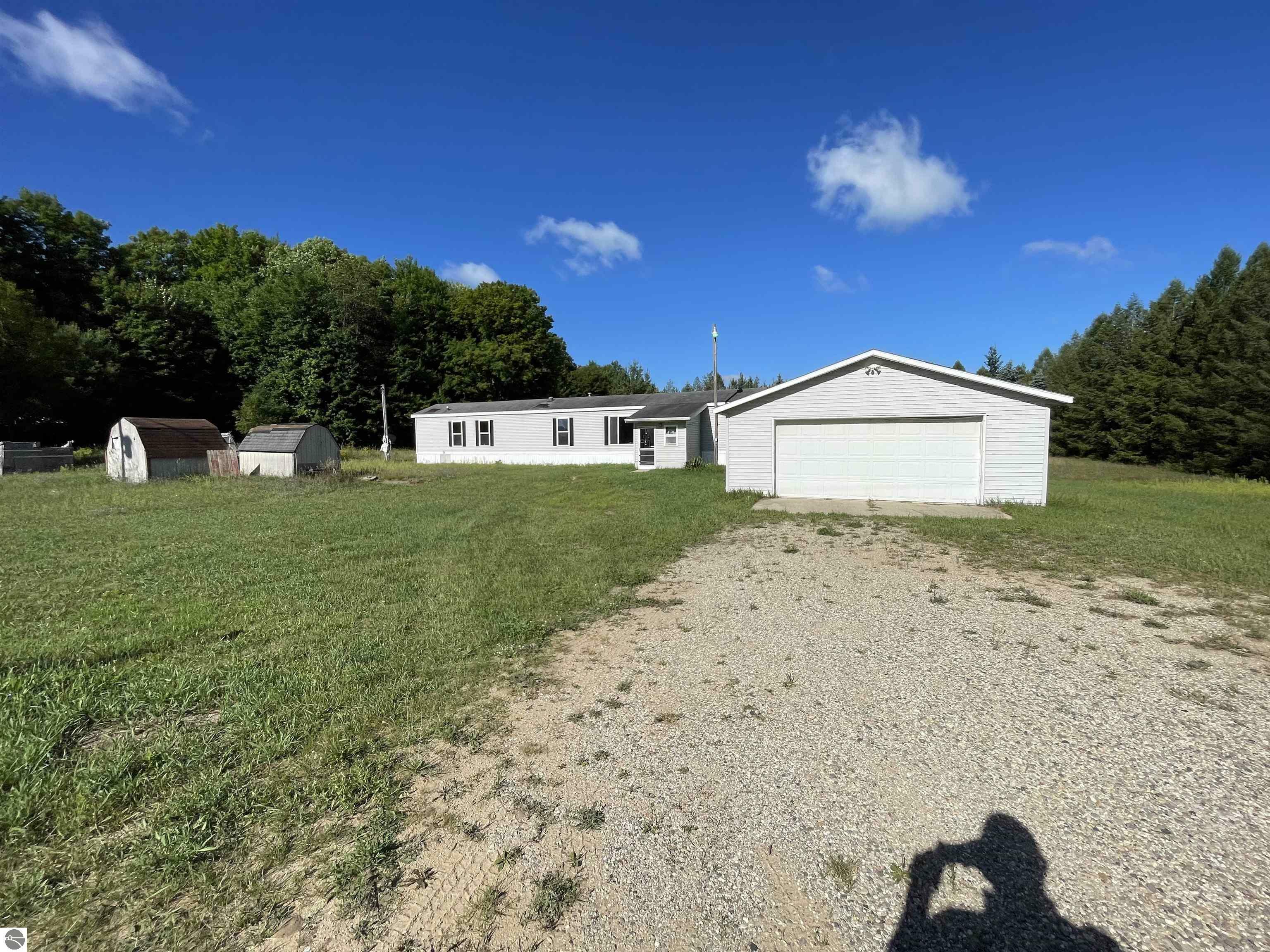 Property Photo:  6496 S 23 1/2 Road  MI 49618-9707 