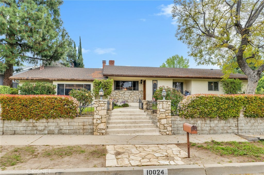 Property Photo:  10024 Genesta Avenue  CA 91325 