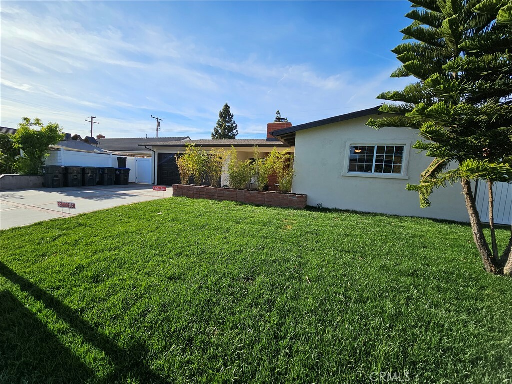 Property Photo:  5631 W Davit Avenue  CA 92704 