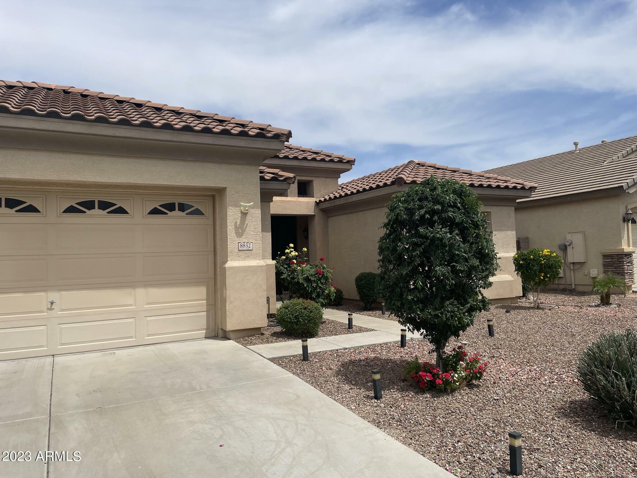 Property Photo: 8832 W Midway Avenue AZ 85305