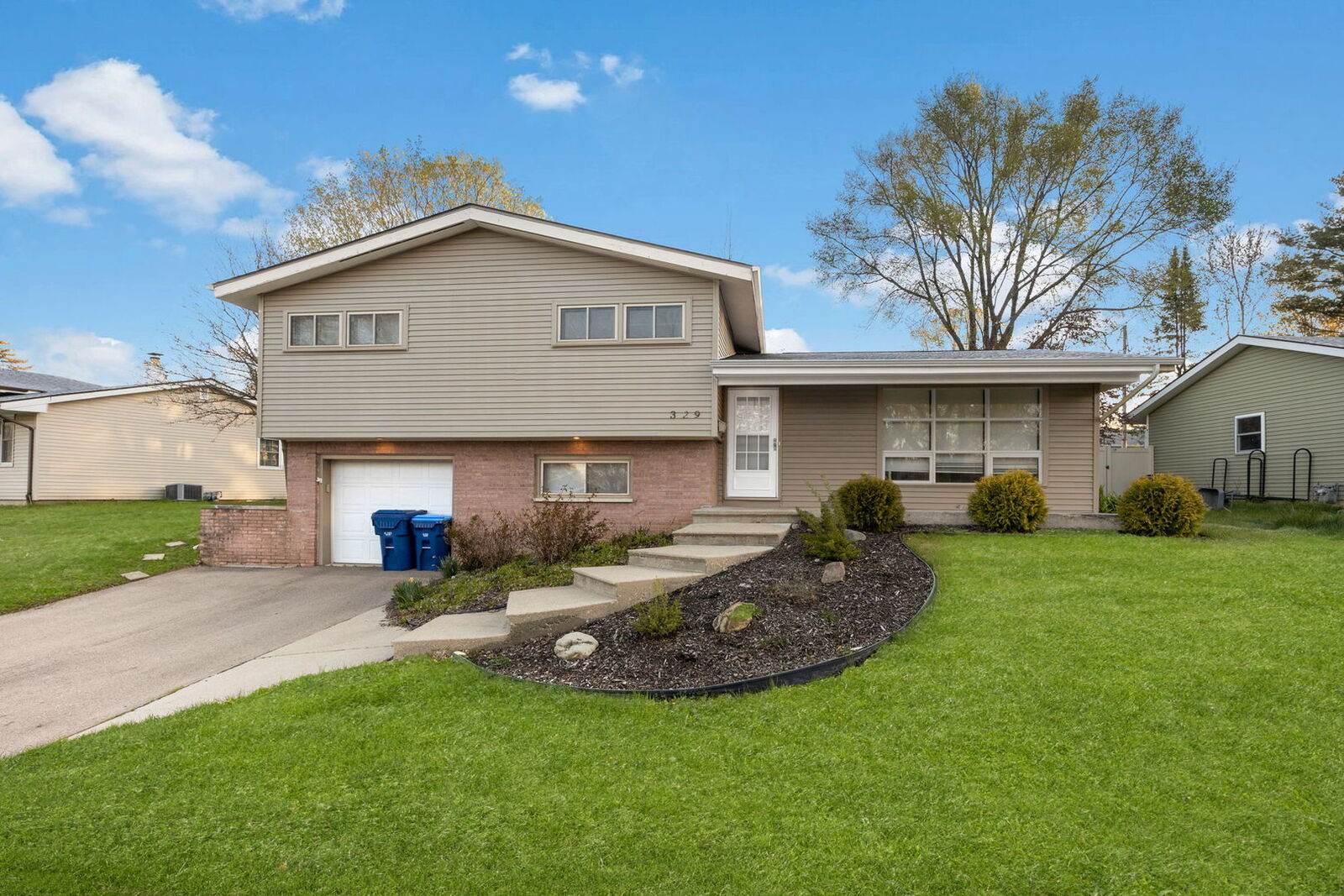 Property Photo: 329 W Hillcrest Drive IL 60115