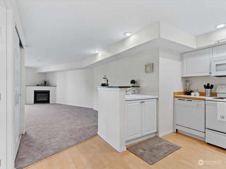 Property Photo:  3318 30th Avenue SW B303  WA 98126 