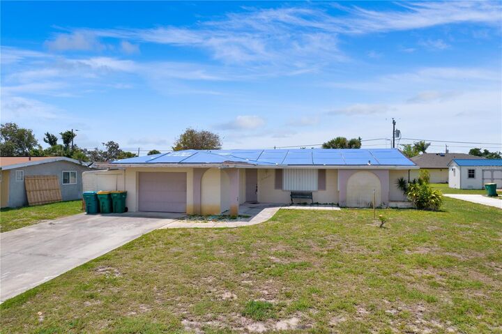 Property Photo:  147 Bedford Drive NE  FL 33952