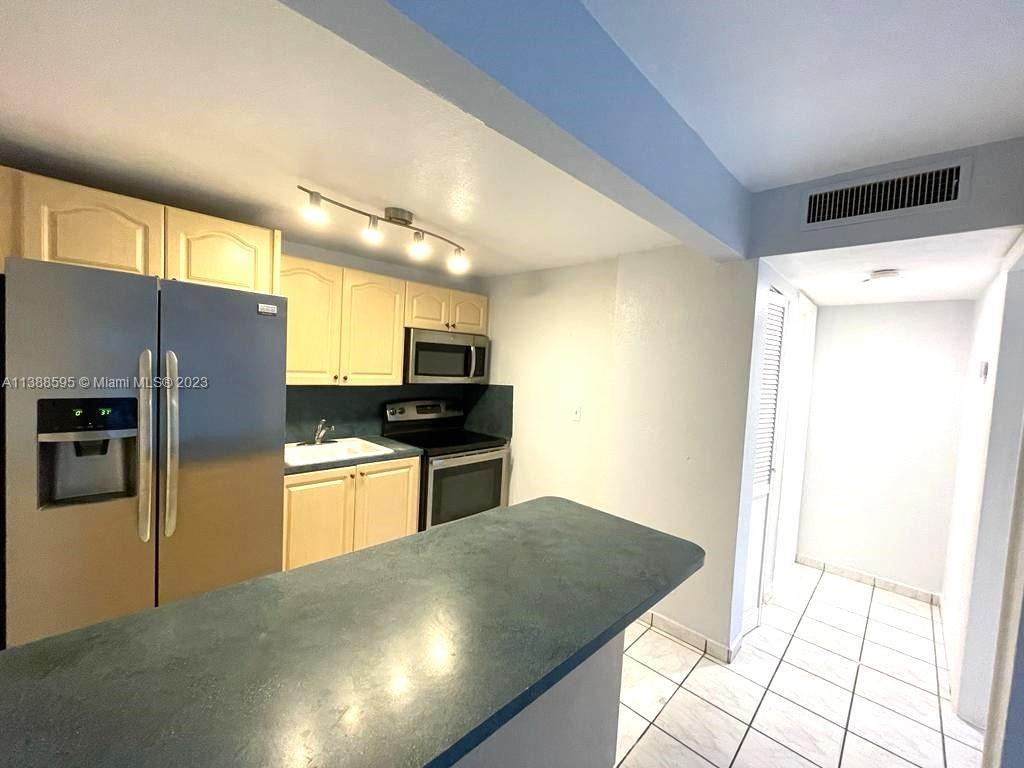 Property Photo:  4275 NW South Tamiami Canal Dr 2-108  FL 33126 
