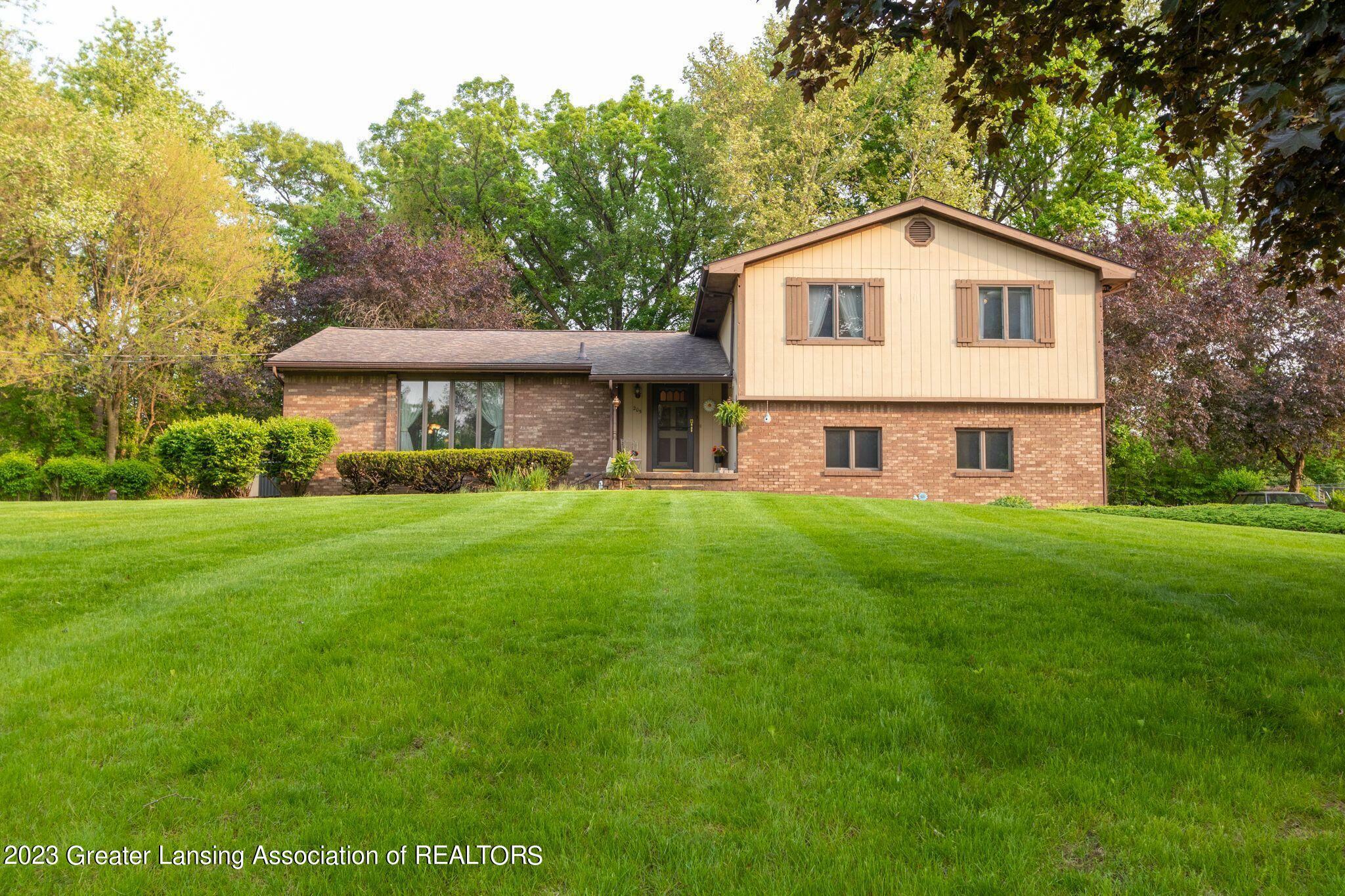 Property Photo:  205 W Dill Drive  MI 48820 