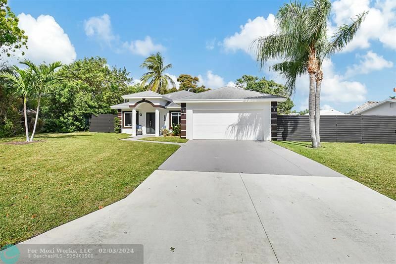 Property Photo:  325 SW 14th Ave  FL 33435 