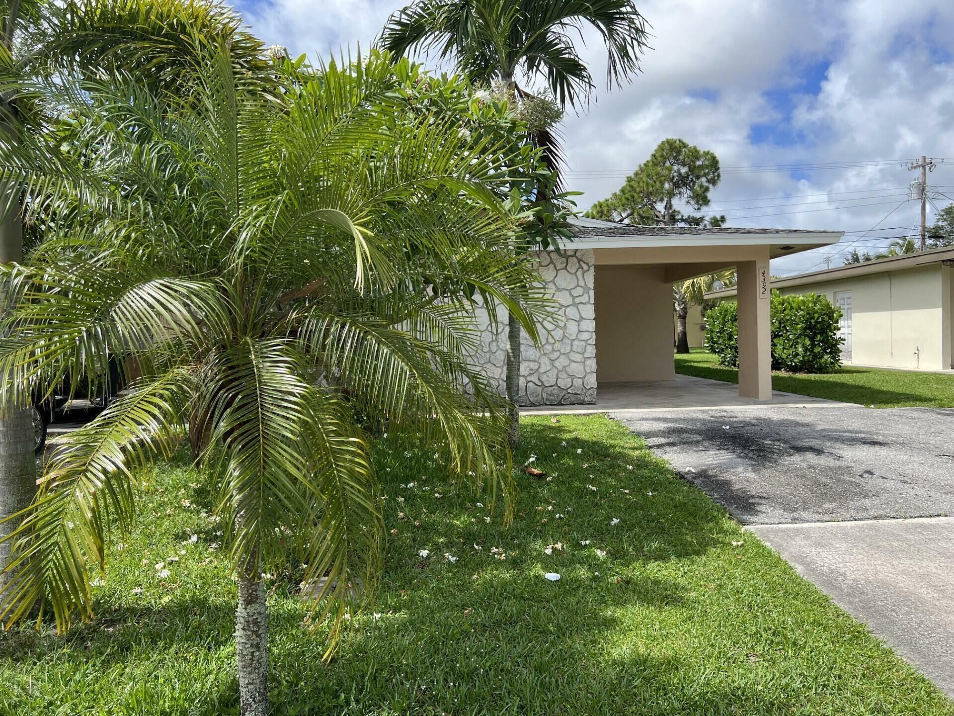 Property Photo:  4392 Golfers Circle W  FL 33410 