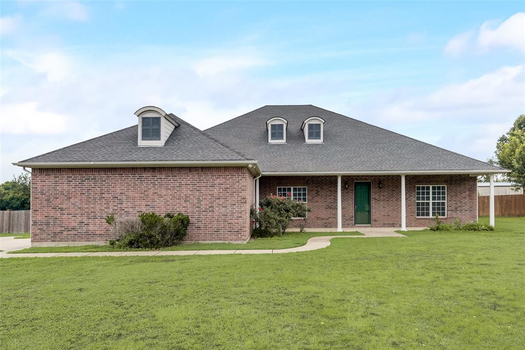 Property Photo: 410 Thorntree Drive TX 75154