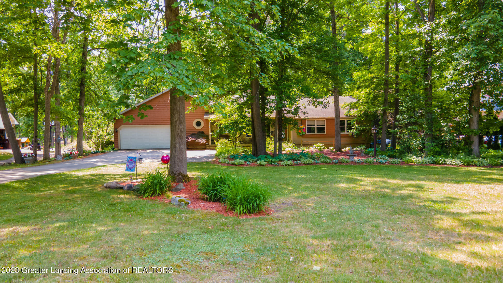 Property Photo:  6371 Pleasant River Drive  MI 48821 