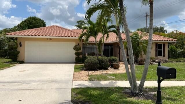 Property Photo:  2498 NW 25th Street  FL 33431 