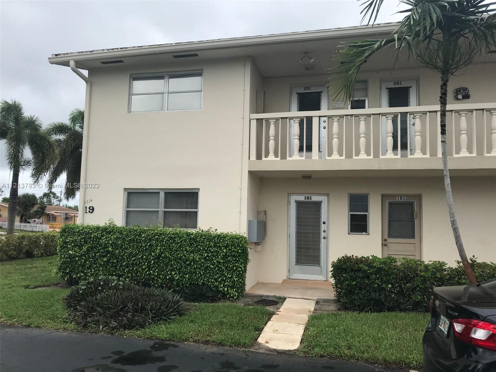 Property Photo:  2214 NE 1st Way 201  FL 33435 