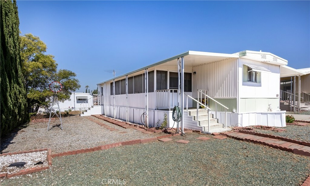 Property Photo:  39335 Vineland Avenue 90  CA 92223 