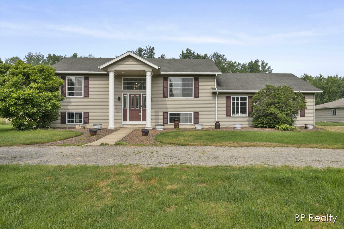 Property Photo:  9085 Ramsdell Drive NE  MI 49341 