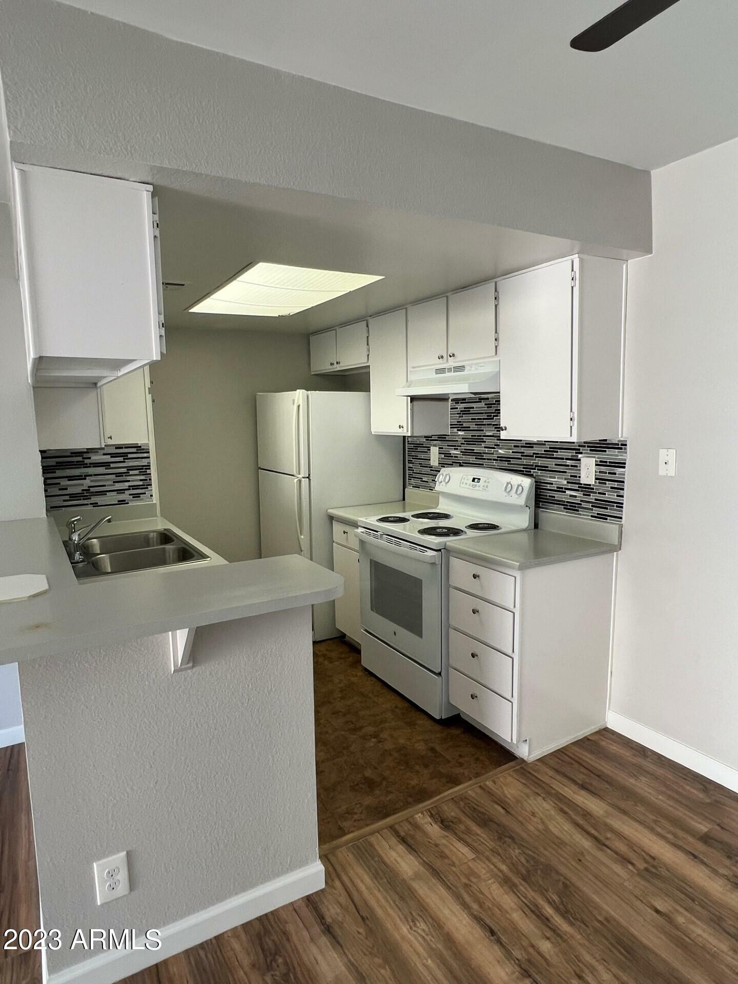 Property Photo:  1111 E University Drive 202  AZ 85288 