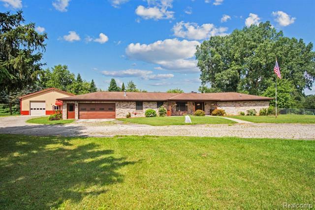 Property Photo:  6099 Fowlerville Road  MI 48836 