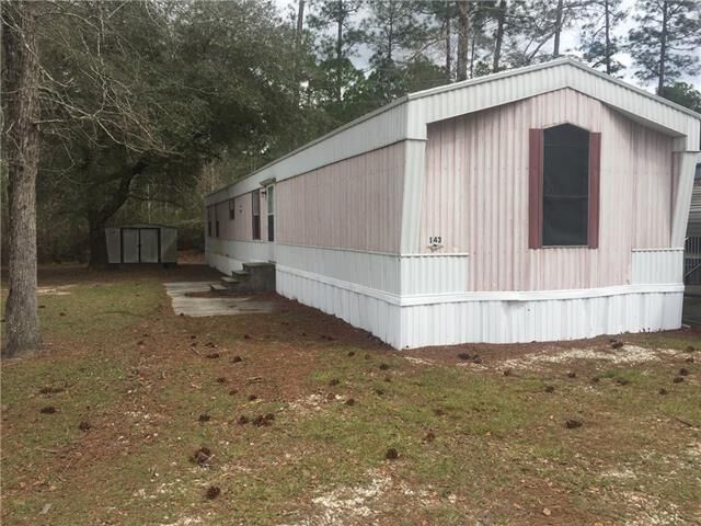 Property Photo:  64096 Mangano Drive 143  LA 70452 