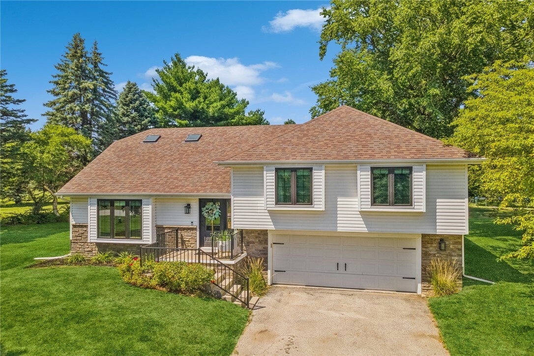 Property Photo:  6255 Oakwood Drive  IA 50266 