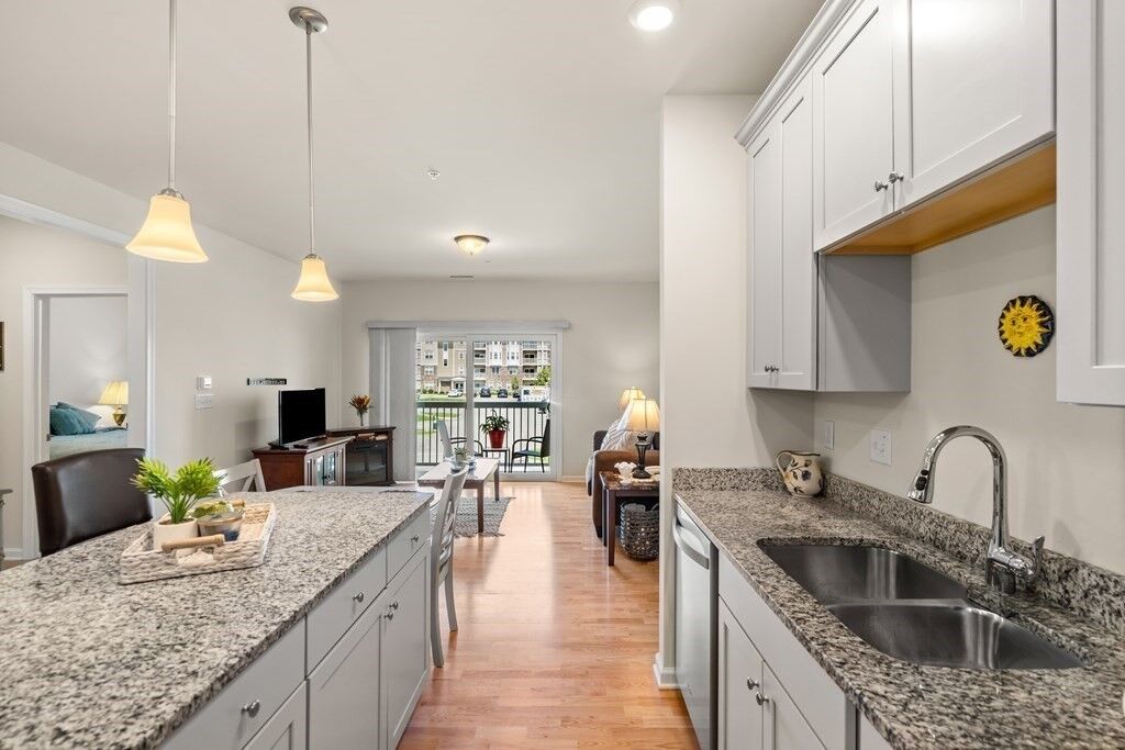 Property Photo:  240 Martins Lndg 202  MA 01864 