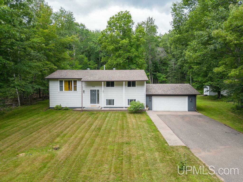 Property Photo:  711 N Maple Hill  MI 49841 