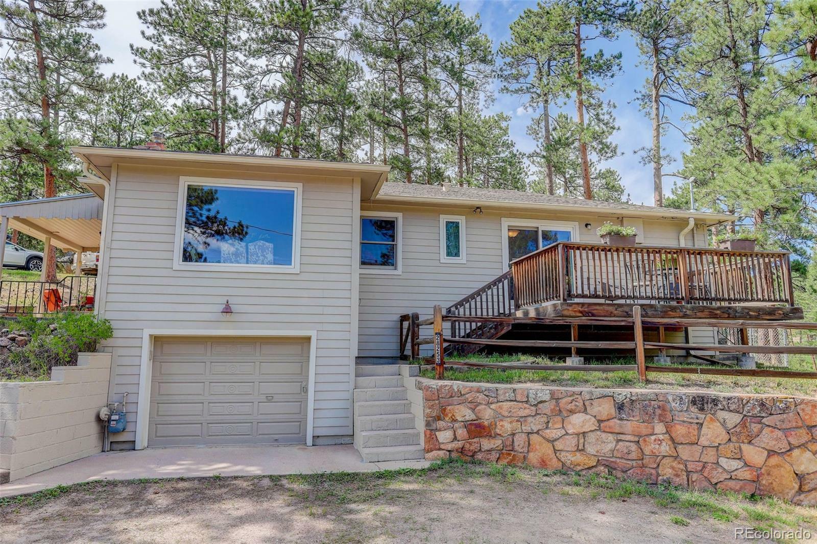 Property Photo:  28253 Kinnikinnick Road  CO 80439 