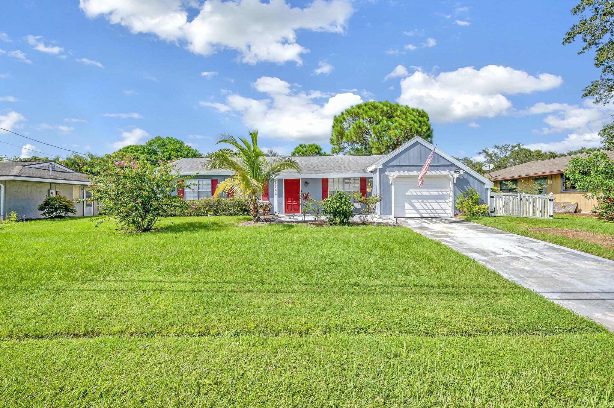 Property Photo:  1743 SE Minorca Avenue  FL 34952 