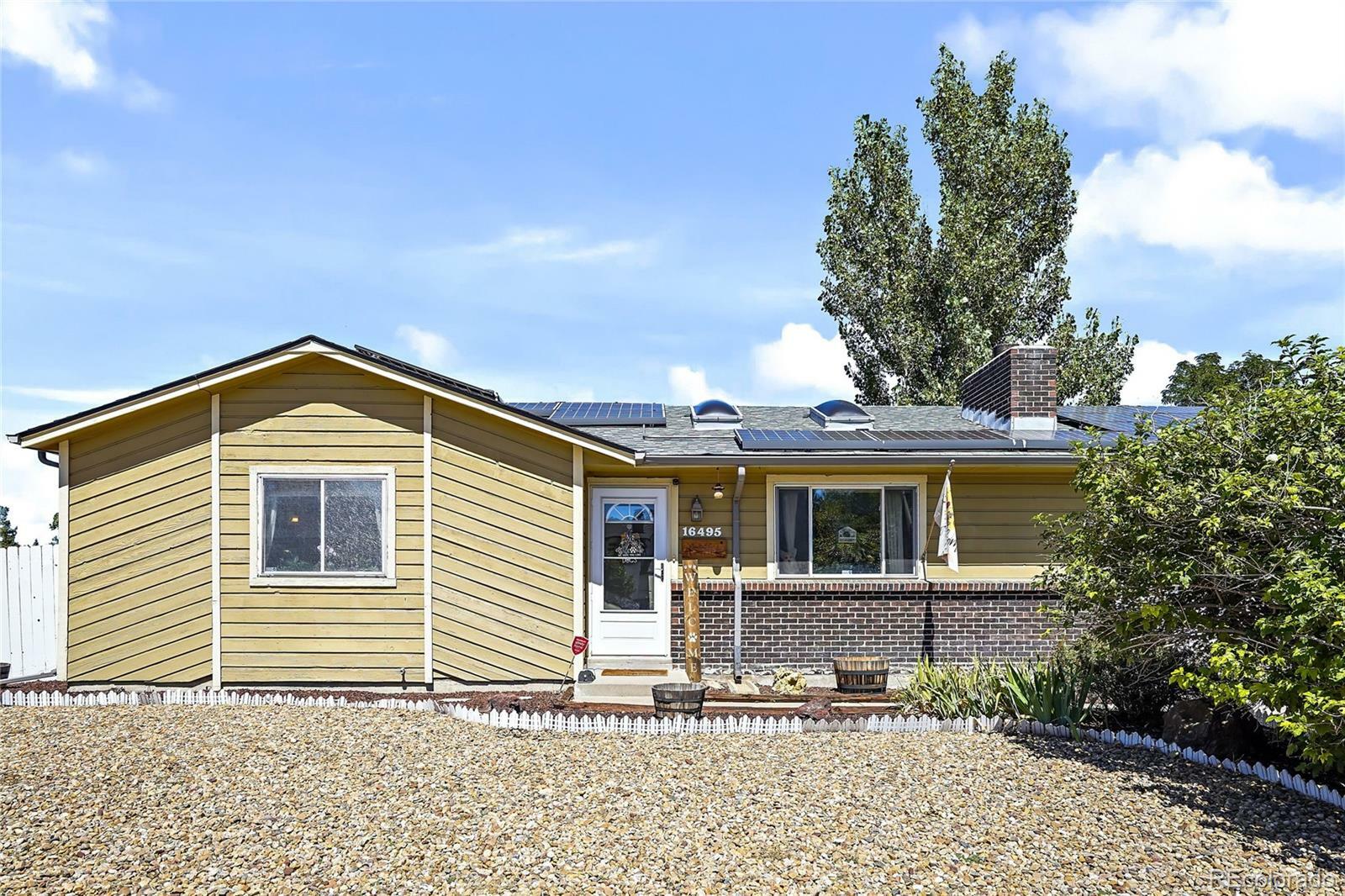 Property Photo: 16495 E 7th Avenue CO 80011