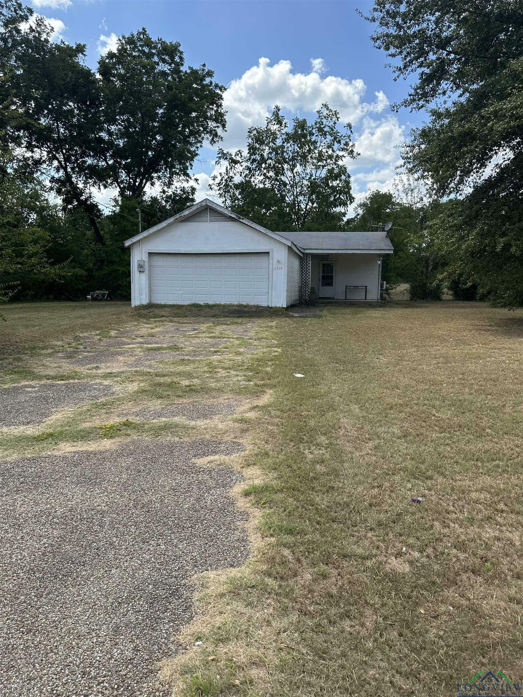 Property Photo:  2309 W Gay Ave  TX 75647 