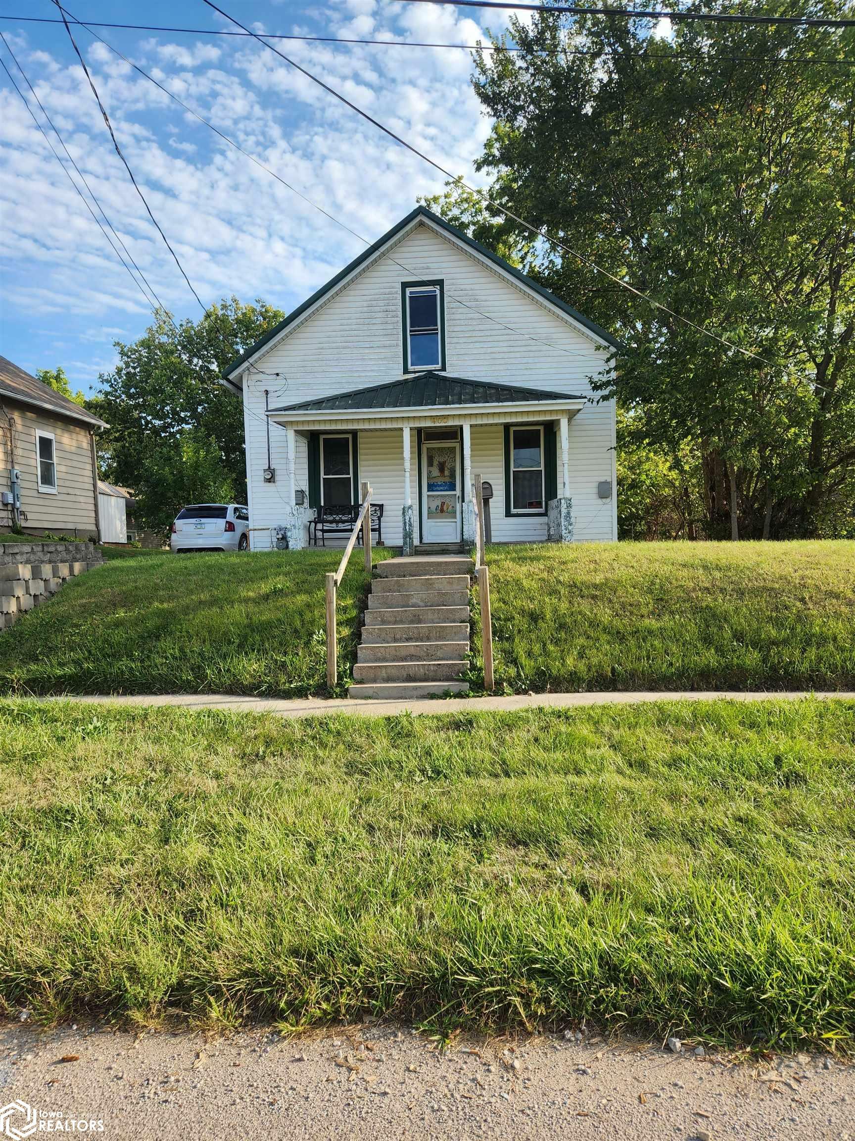 Property Photo:  408 Benton Avenue  IA 52531 