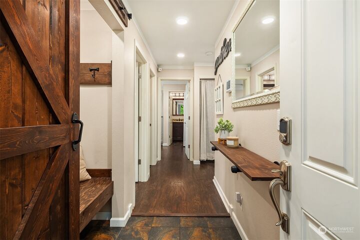 Property Photo:  5620 14th Drive W 206  WA 98203 