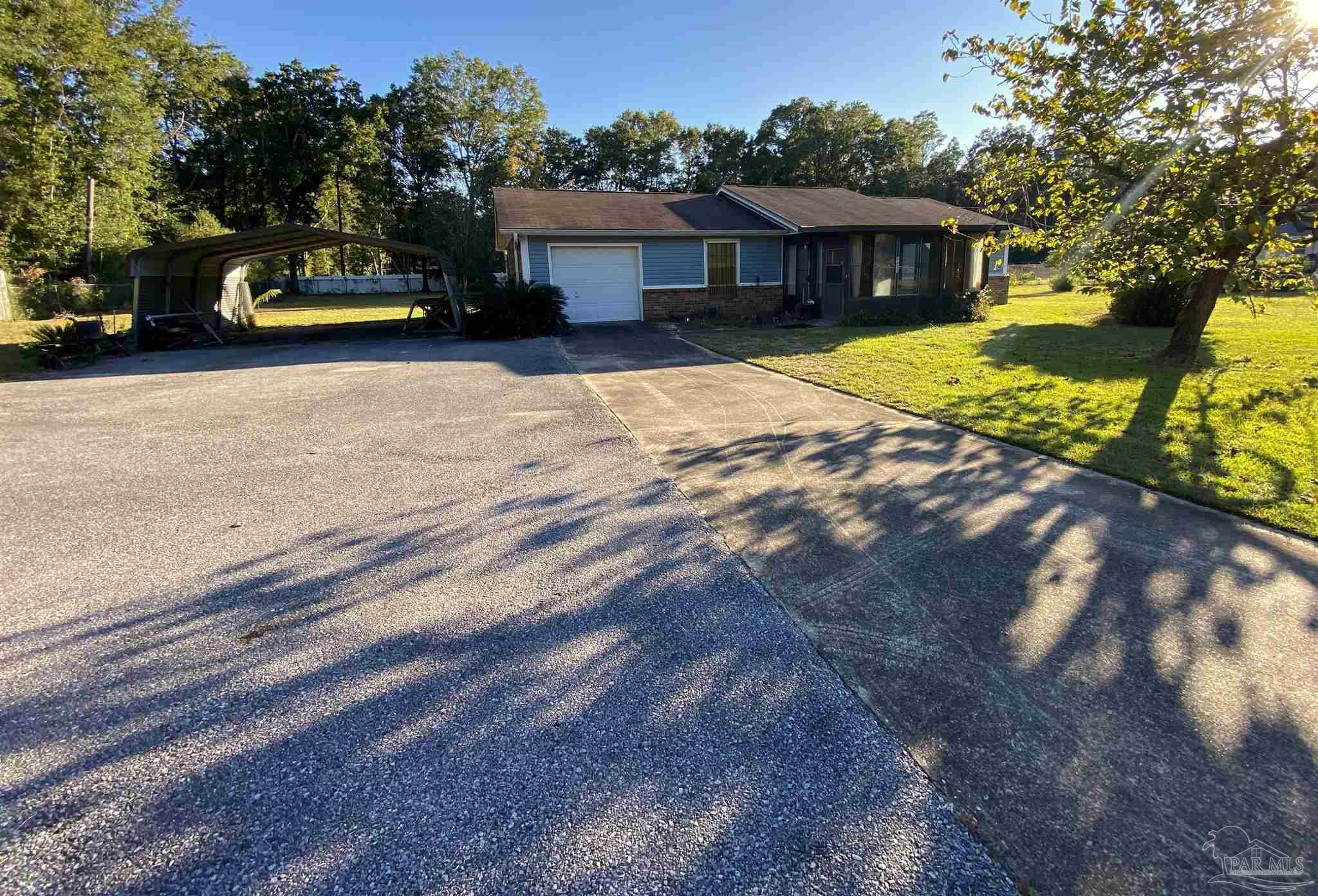 Property Photo:  5433 Columbia Ave  FL 32570 