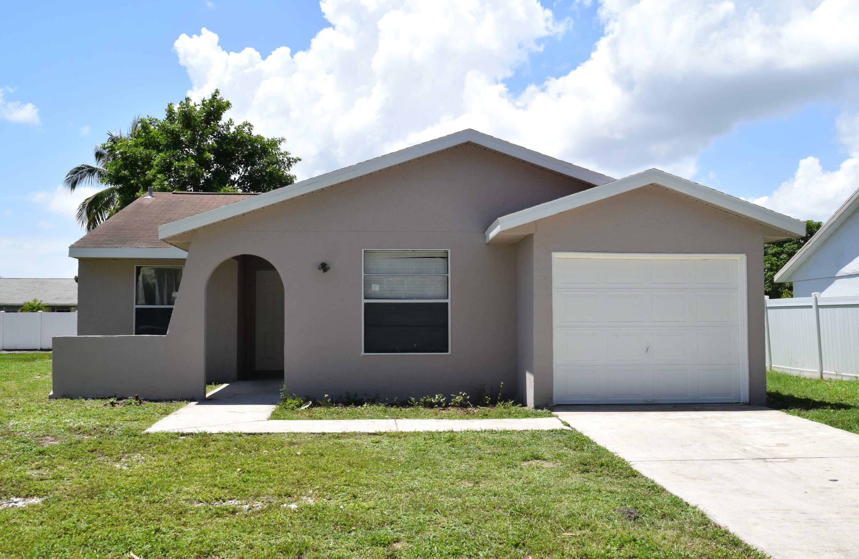 Property Photo:  4846 Classic Drive  FL 33417 