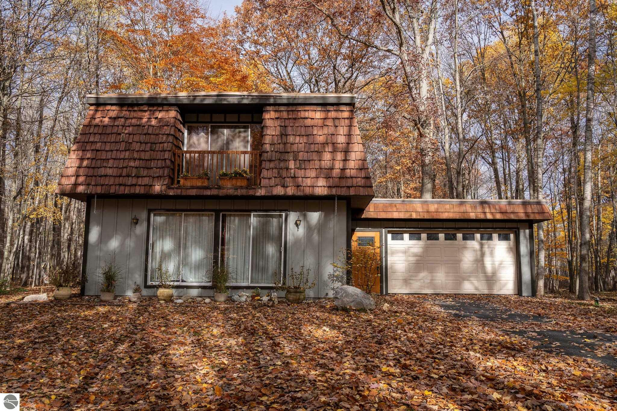 Property Photo:  568 Hiawatha Drive  MI 48858 