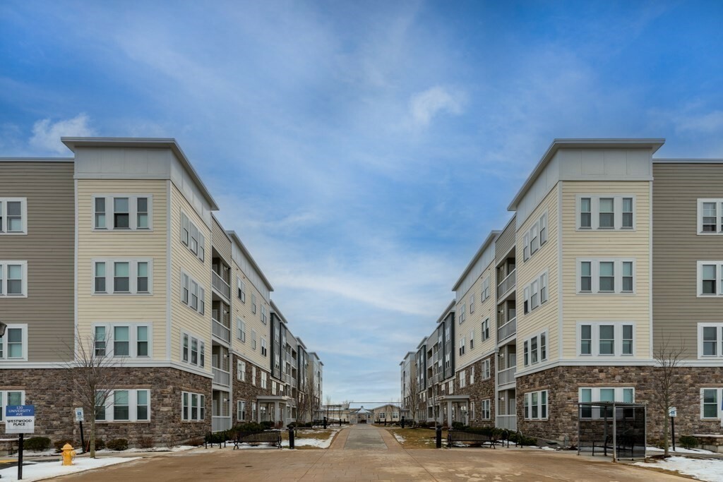Property Photo: 120 University Ave 2106 MA 02090