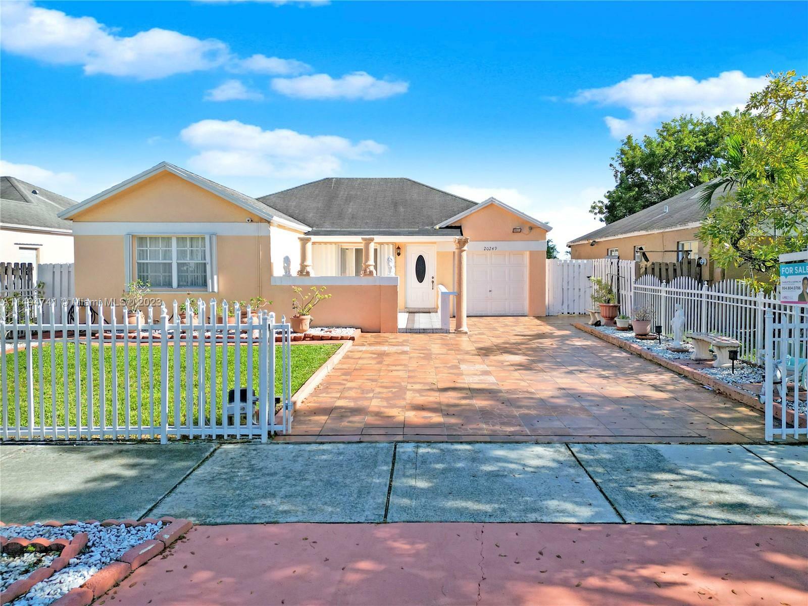 Property Photo:  20249 NW 32nd Ave  FL 33056 