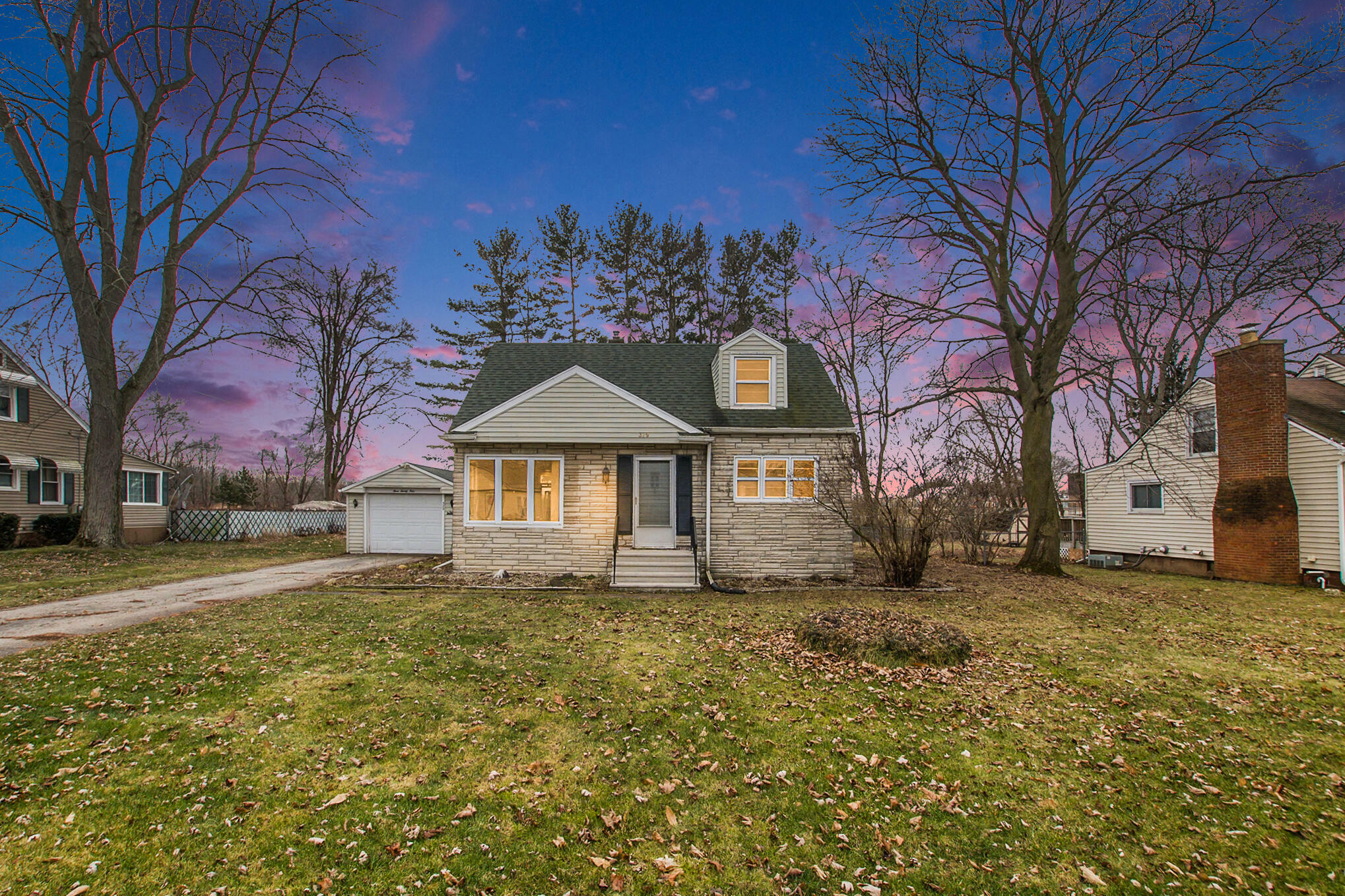 Property Photo:  329 Peacock Walk  MI 49202 