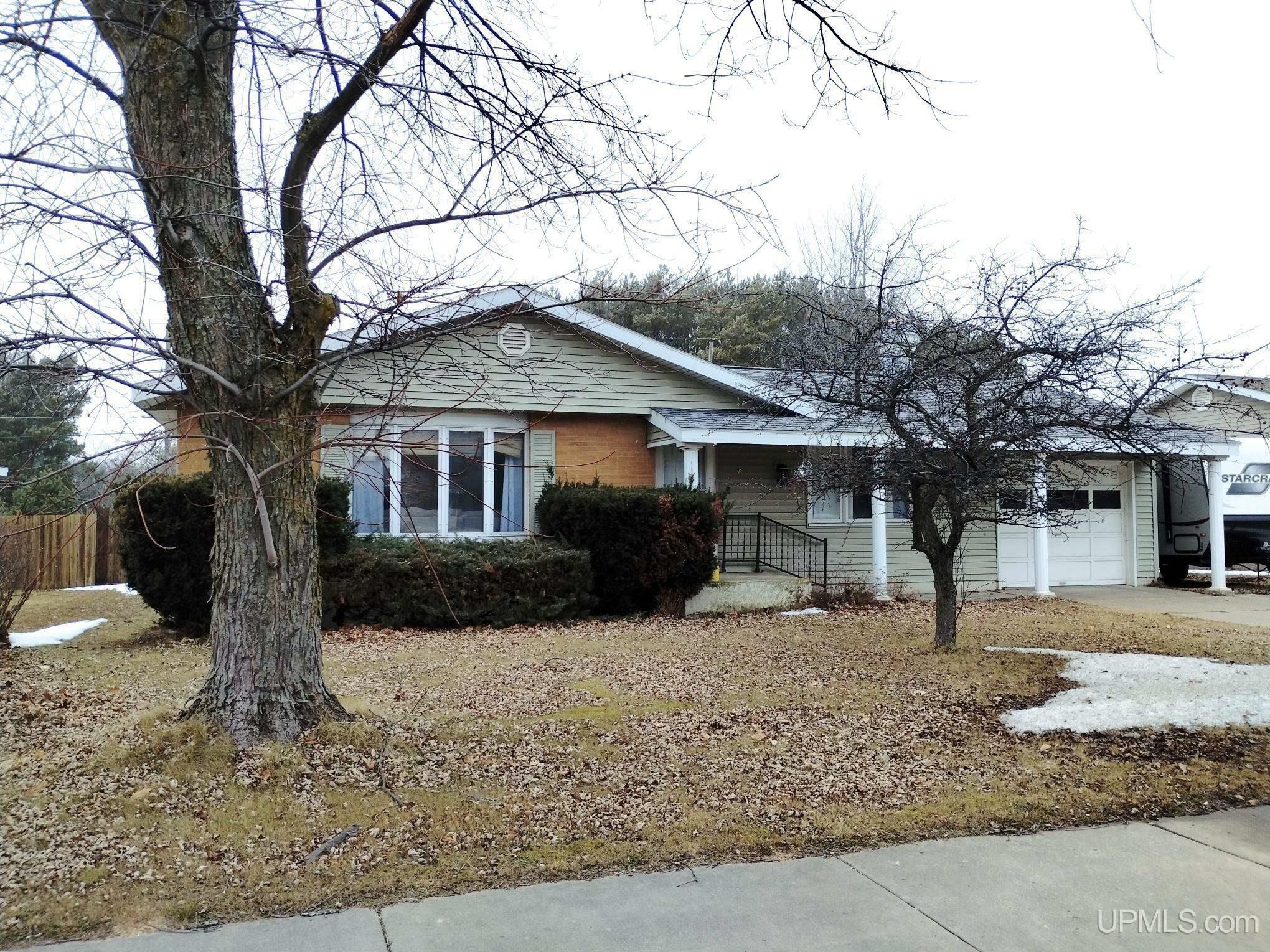 Property Photo:  1118 S Lincoln  MI 49829 