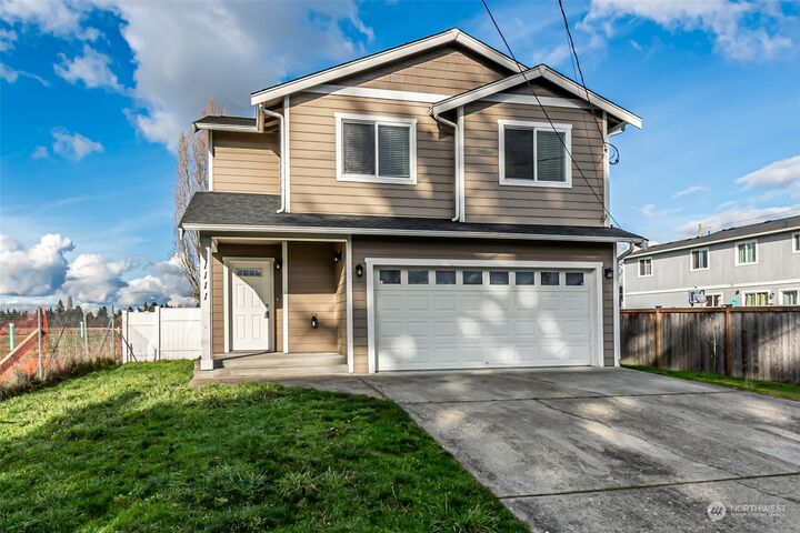 Property Photo:  1111 S 34th Street  WA 98418 