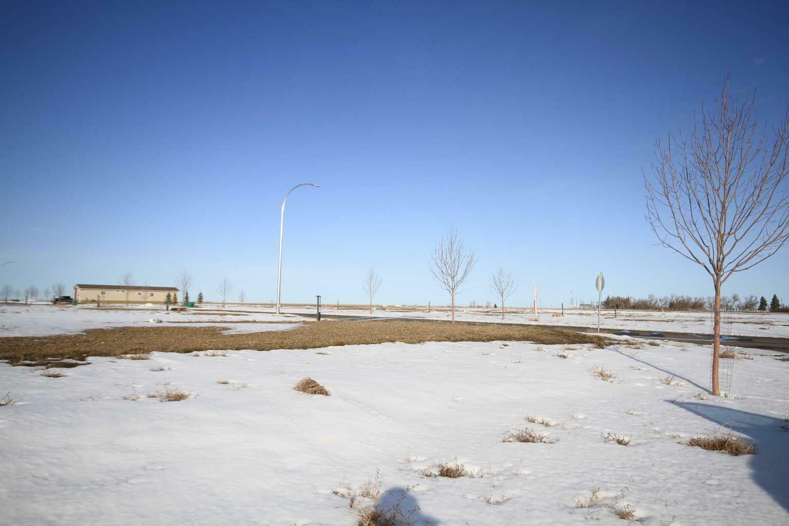 Property Photo:  167 Meadows Crescent  AB T1G 0G7 