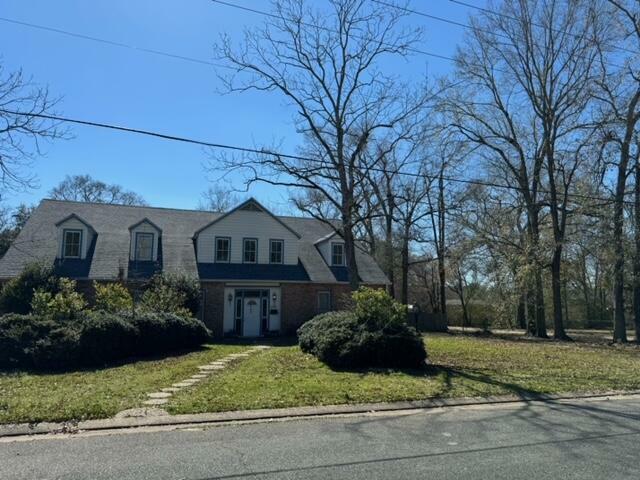 Property Photo: 1109 W Port St LA 70634