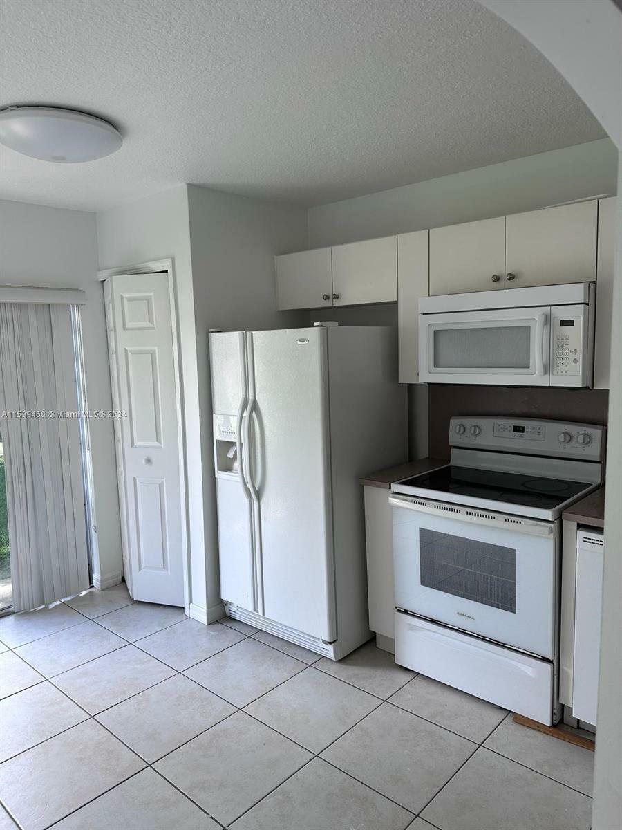 Property Photo:  2931 SE 13th Ave 104-47  FL 33035 