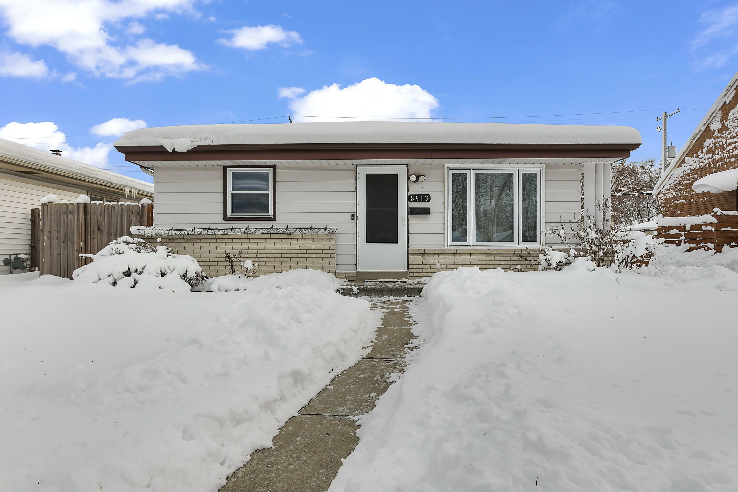 Property Photo:  8913 W Herbert Ave  WI 53225 