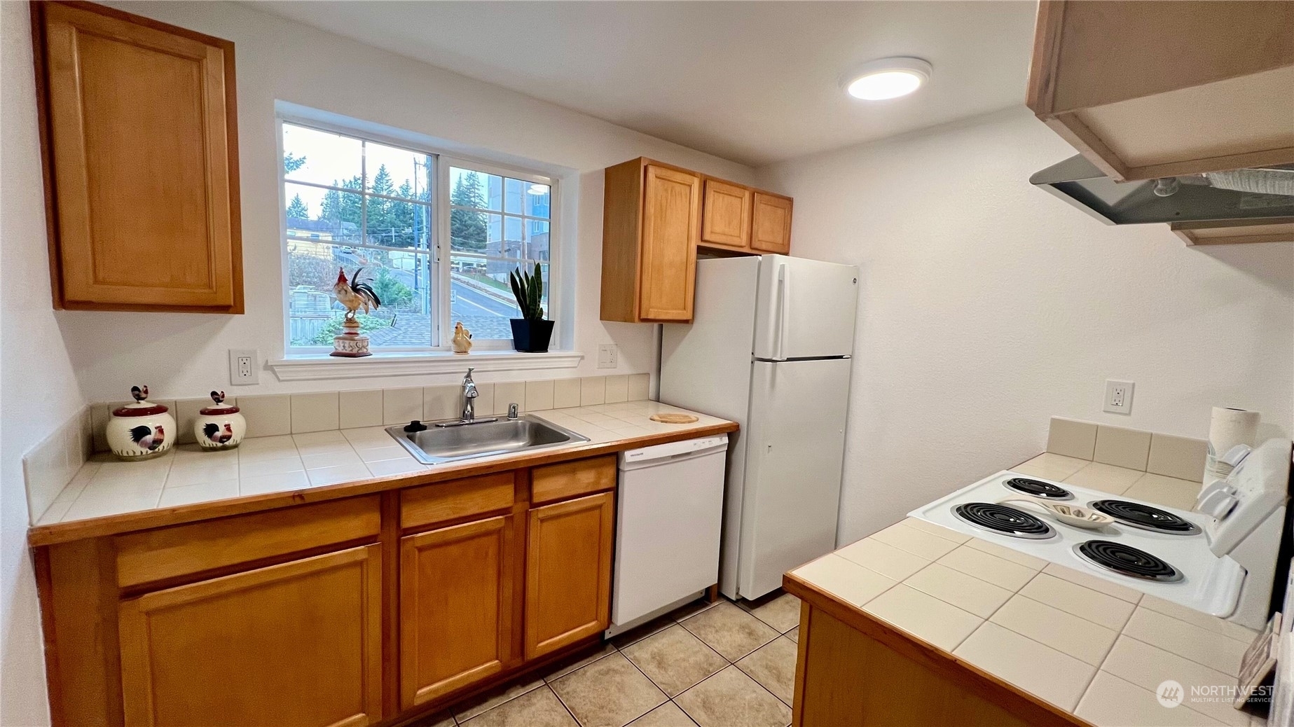 Property Photo:  1127 N 198th Street A302  WA 98133 