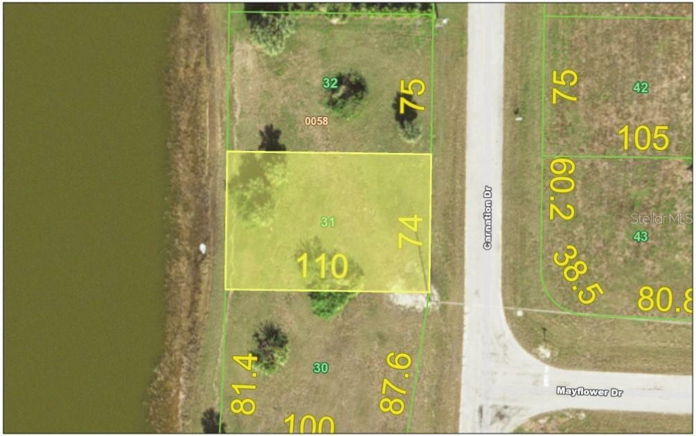 Property Photo: 61 Carnation Dr FL 33946