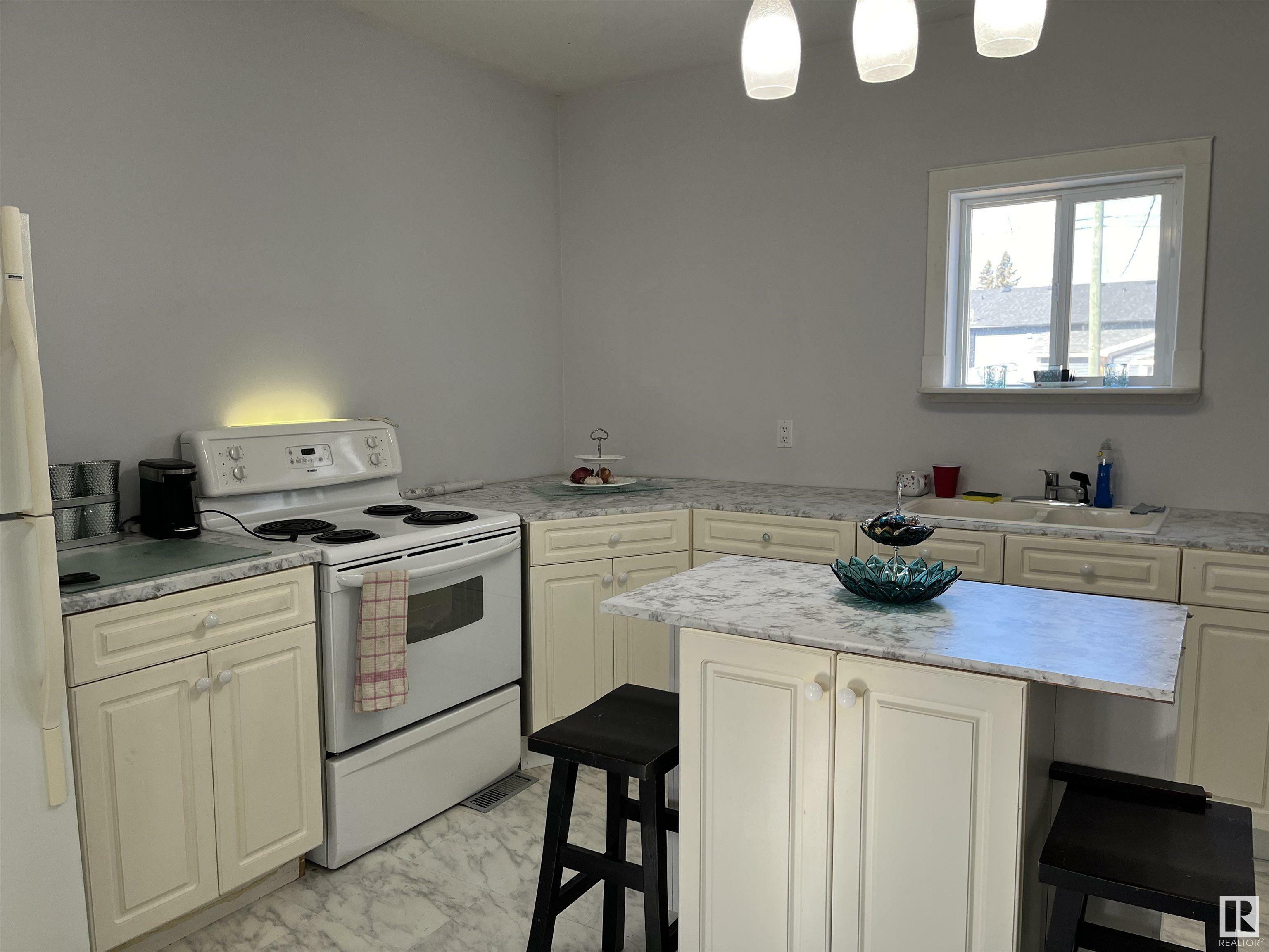 Property Photo:  5112 51 Street  AB T9N 2H4 