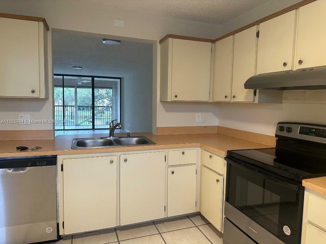 Property Photo:  8592 W Sunrise Blvd 214  FL 33322 